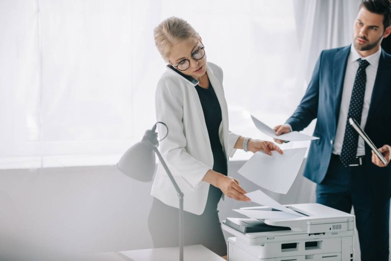 businesswoman using printer
